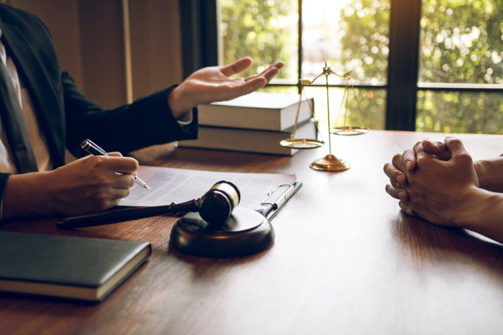 Business lawyer is currently counseling the client's trial at the lawyer office.